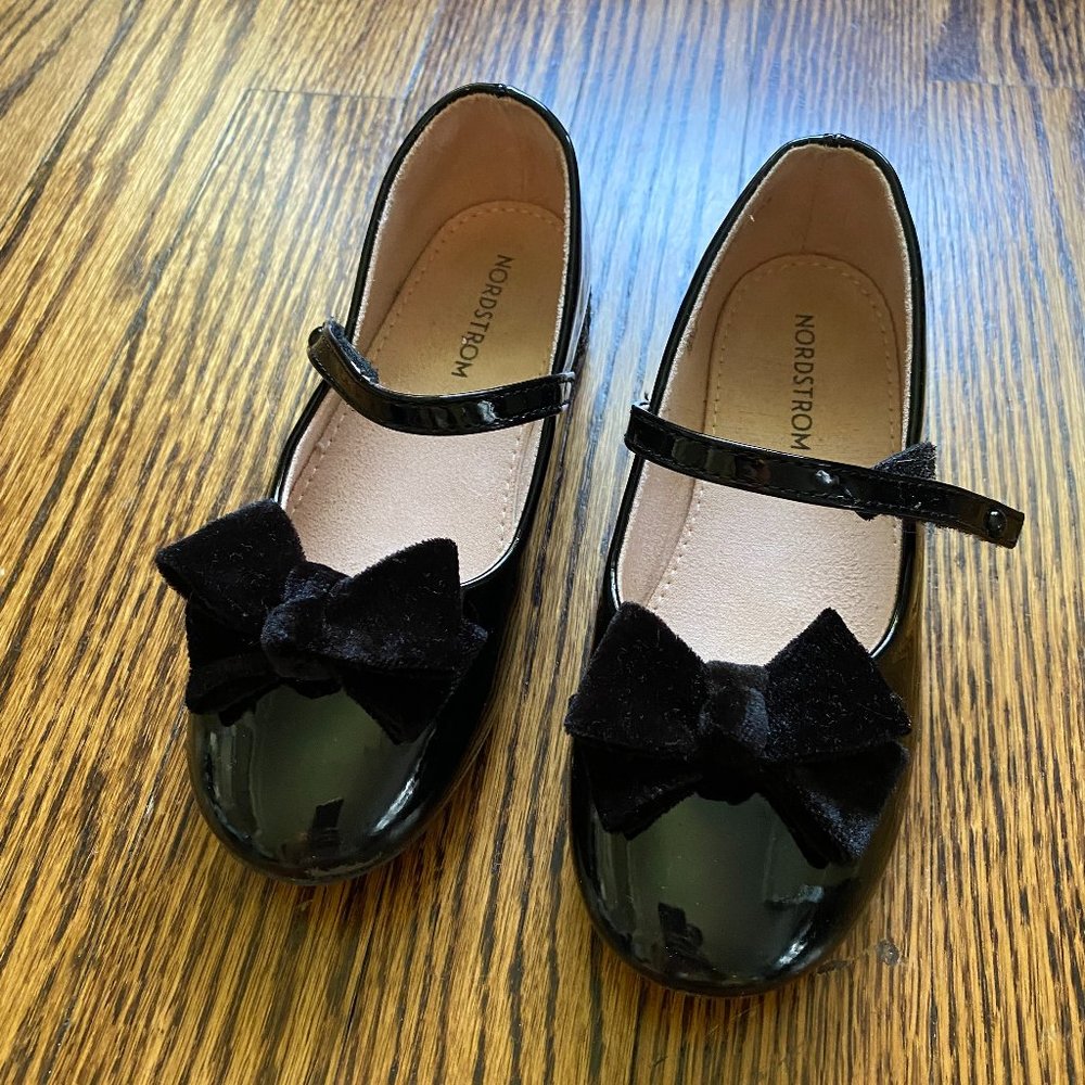 Black Patent Mary Jane's with a glittery heel